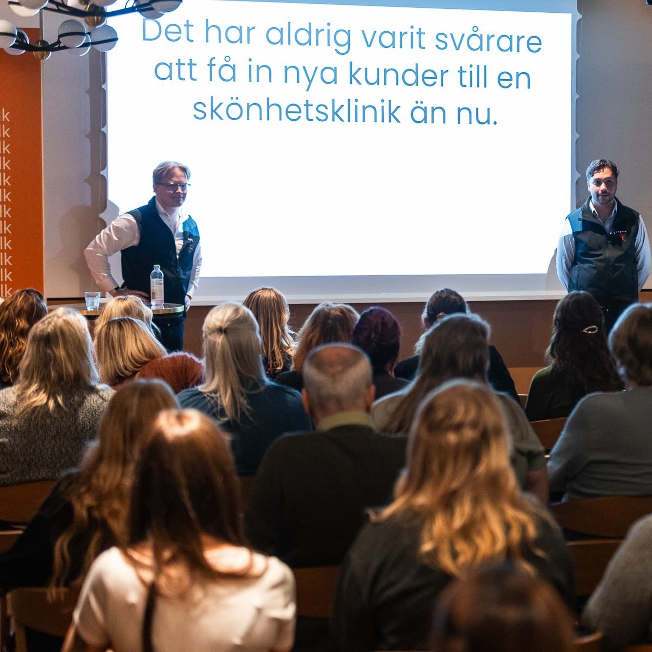 Arvid and Elias speaking to clinic owners